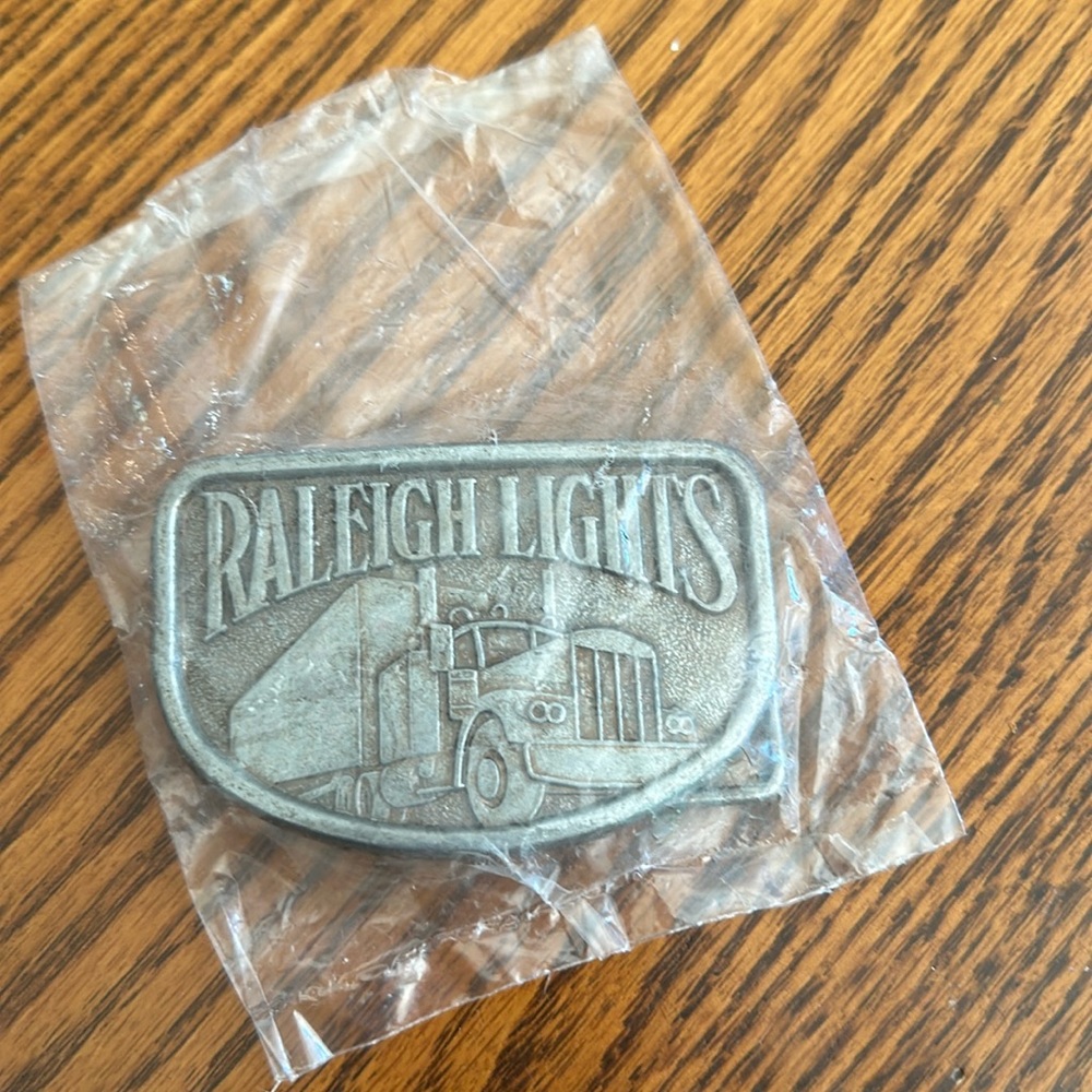 Raleigh Lights Semi Truck Belt Buckle Vintage Unopened